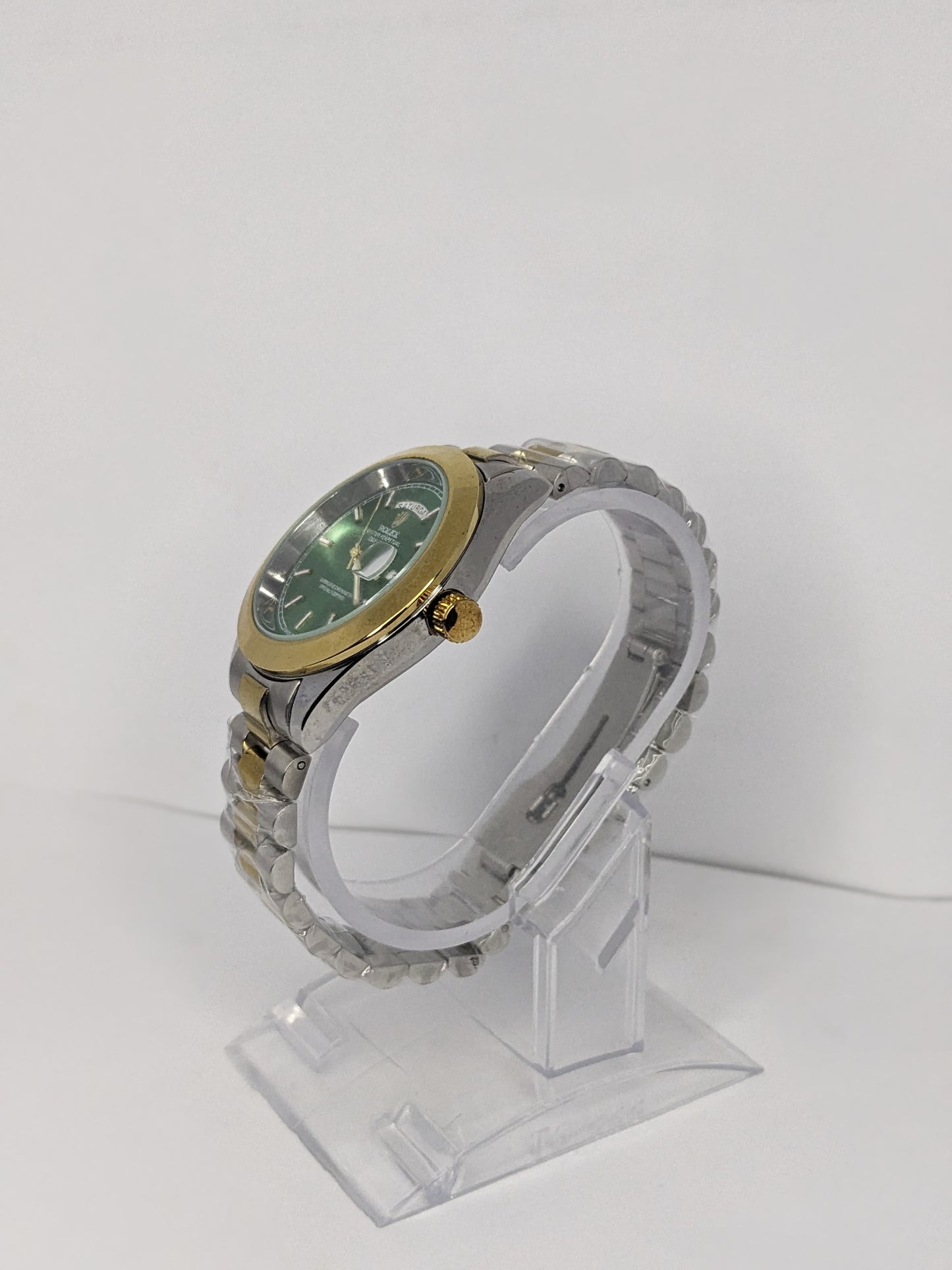 Refined Brilliance: Rolex with Silver Chain & Classic Dial