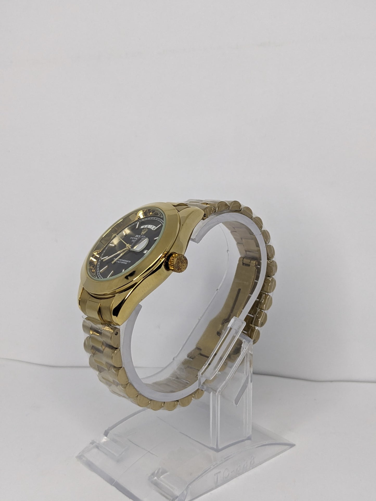 Golden Chain, Black Dial: Rolex Excellence