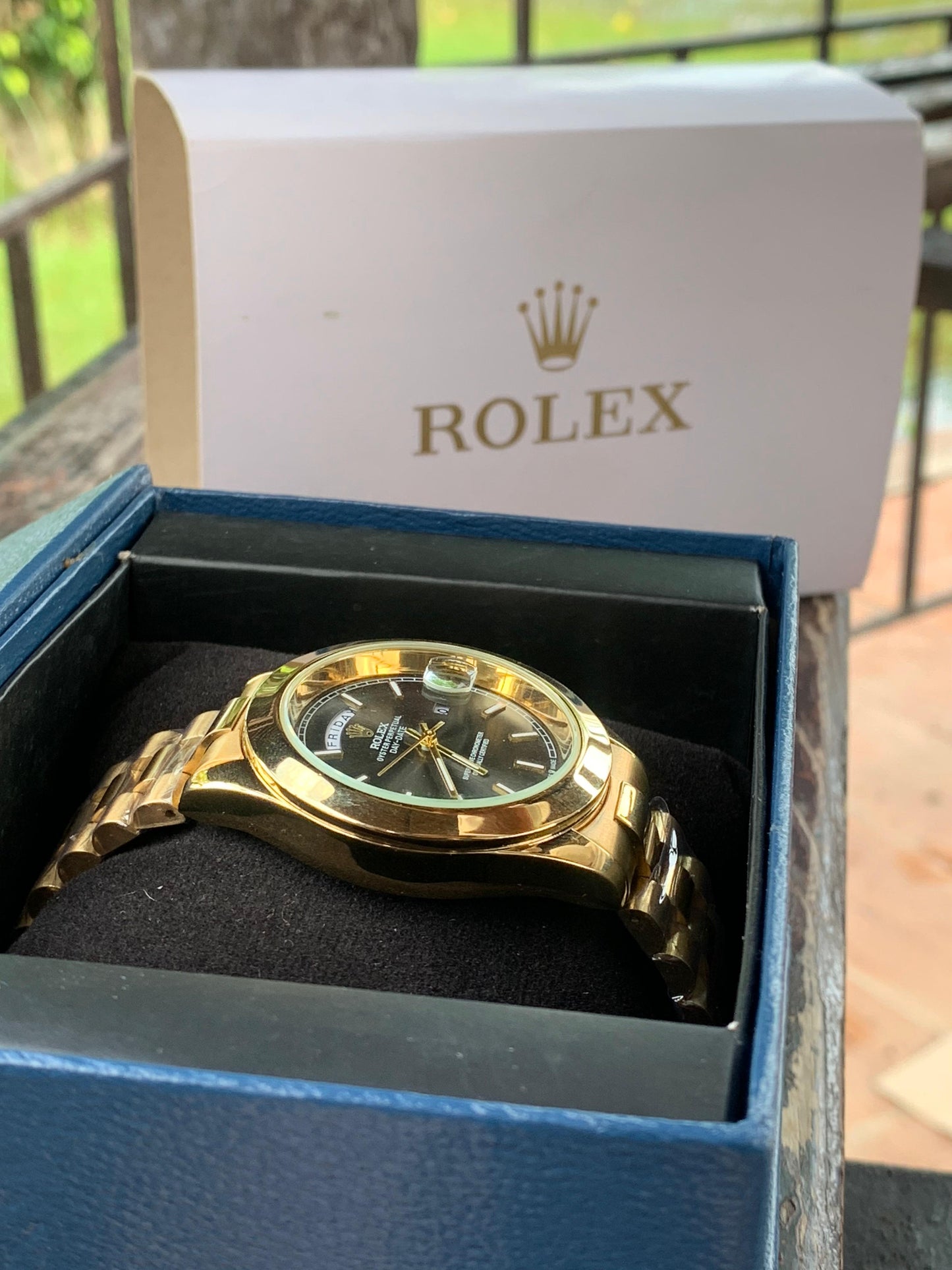 Golden Chain, Black Dial: Rolex Excellence