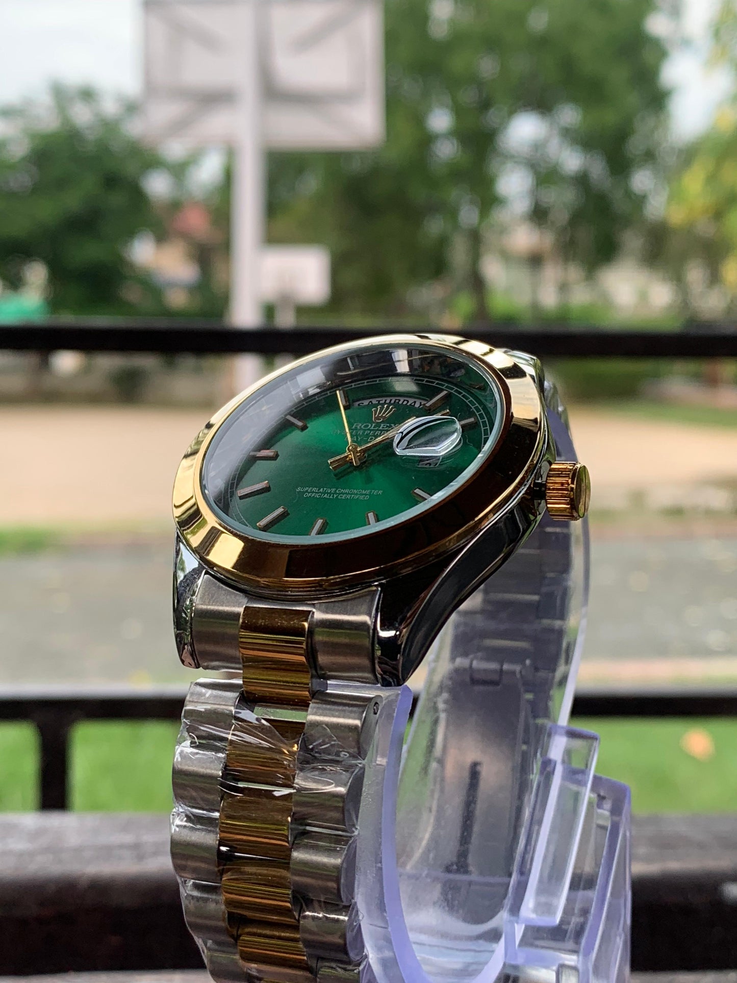 Refined Brilliance: Rolex with Silver Chain & Classic Dial